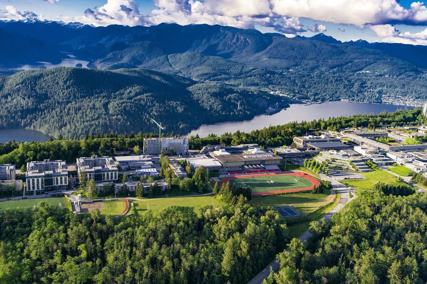 SFU students and cleaning robot on campus